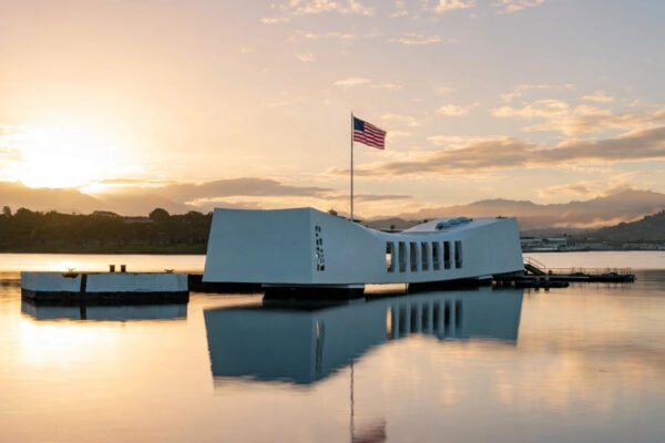 Pearl Harbor attack: the USS Arizona Memorial at sunrise over the sunken battleship